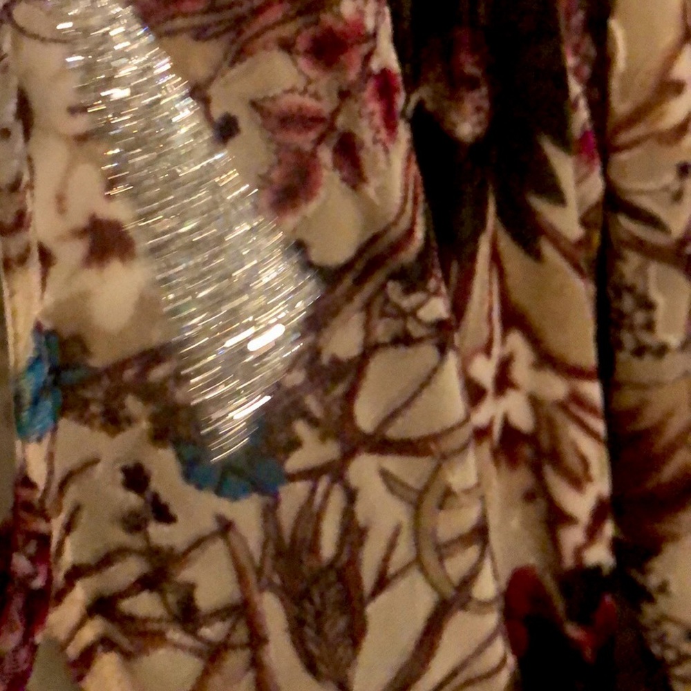 Velvet romper with partial see through fabric.
